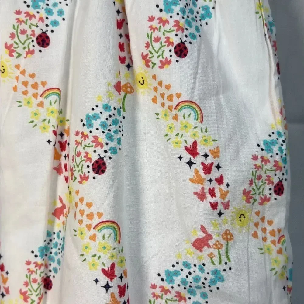 Lullaby Lane yellow and white Sleeveless smocked one piece romper 6-9 months NWT
